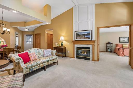 Master bedroom is to the right of gas fireplace