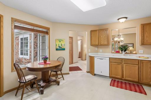 Breakfast area has sunny views of landscaping