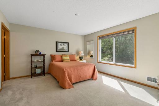 Master bedroom has views of landscaped berm