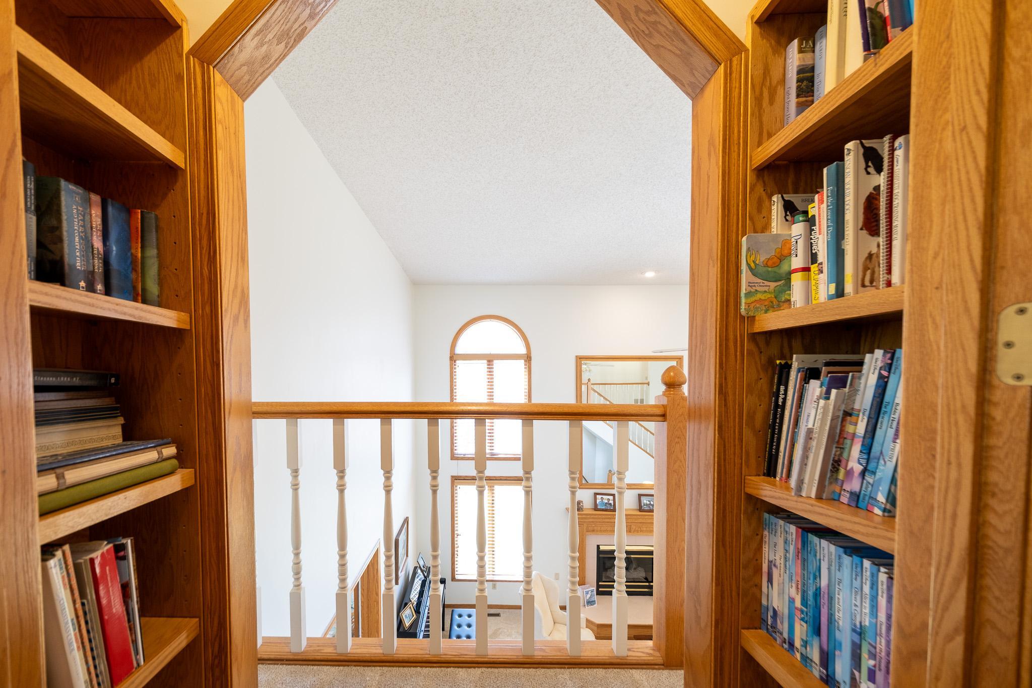 Your own private book area, complete with balcony overlooking the main living space