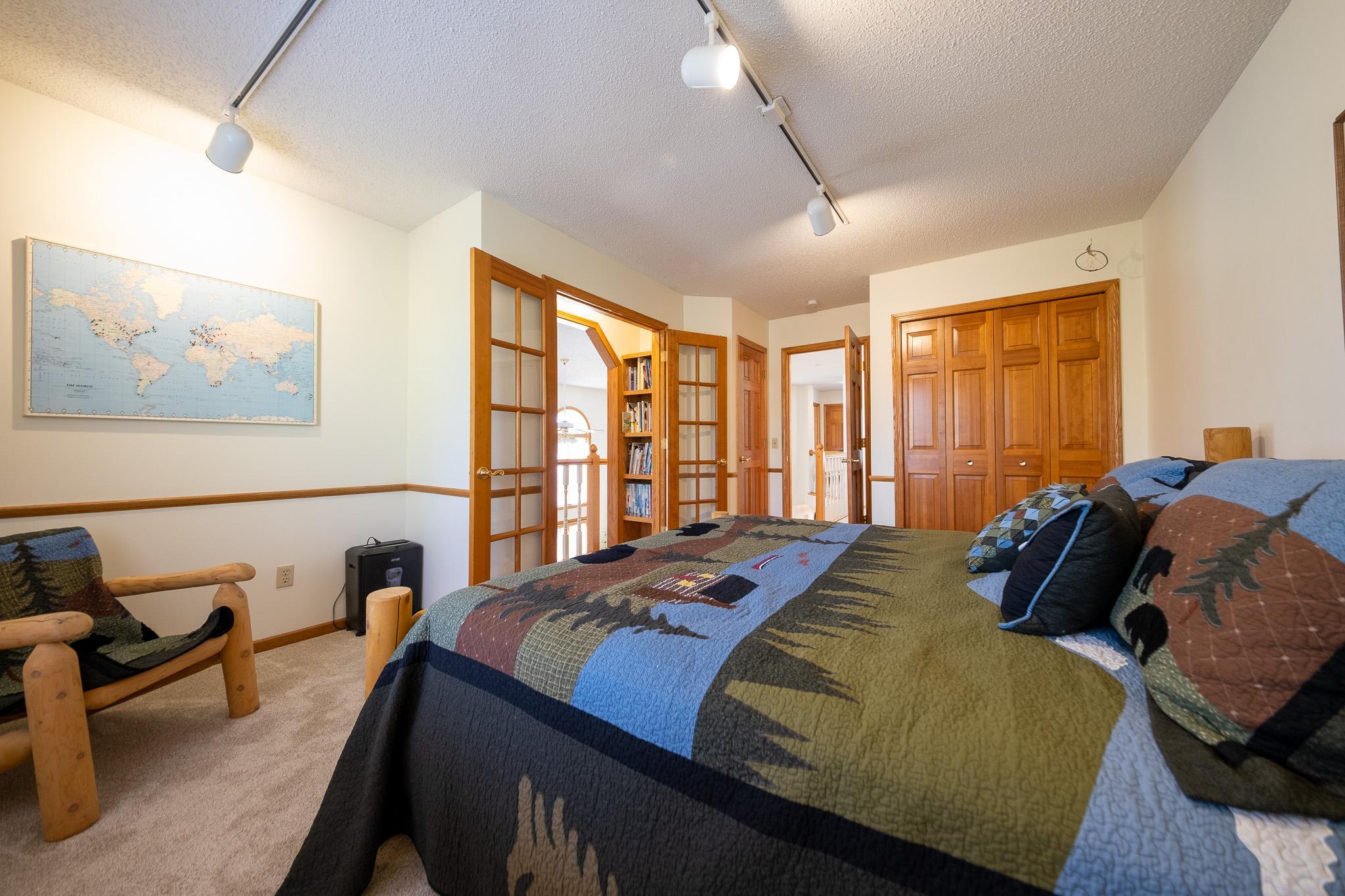 Upper Back Bedroom with Bookshelf Balcony over the living room.