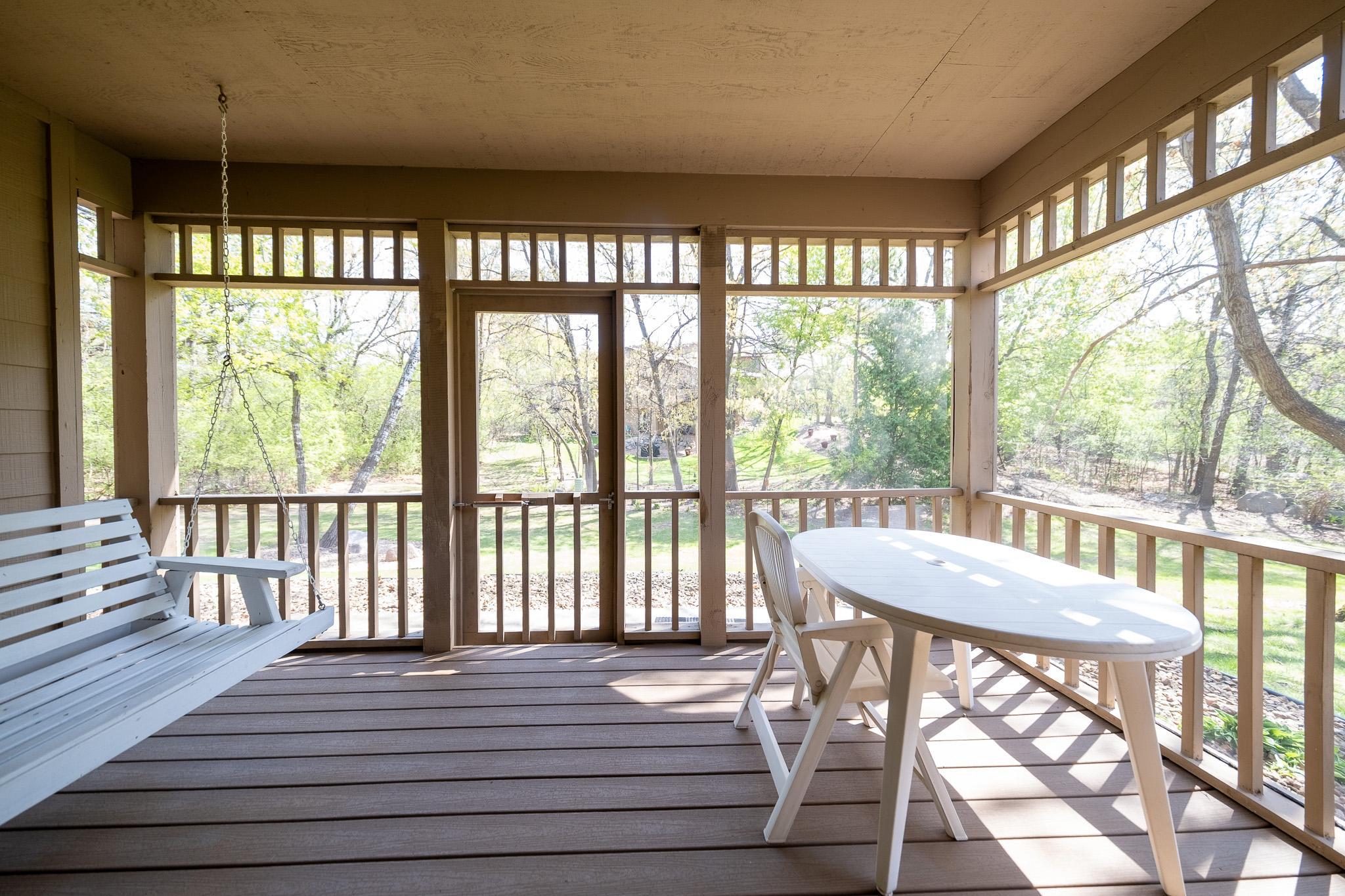 Great nature views and door leading to backyard space