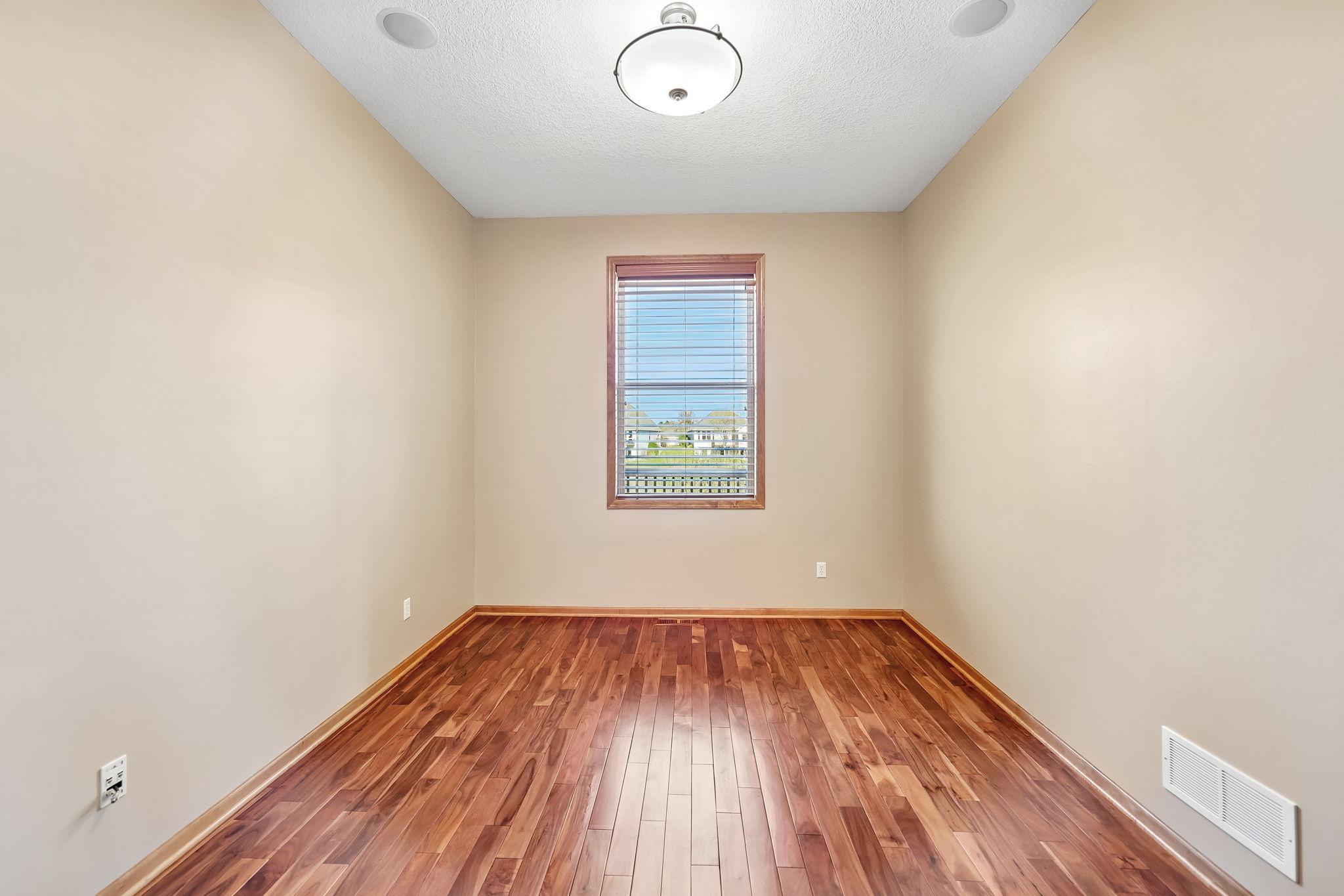 Main level office with beautiful hardwood floors