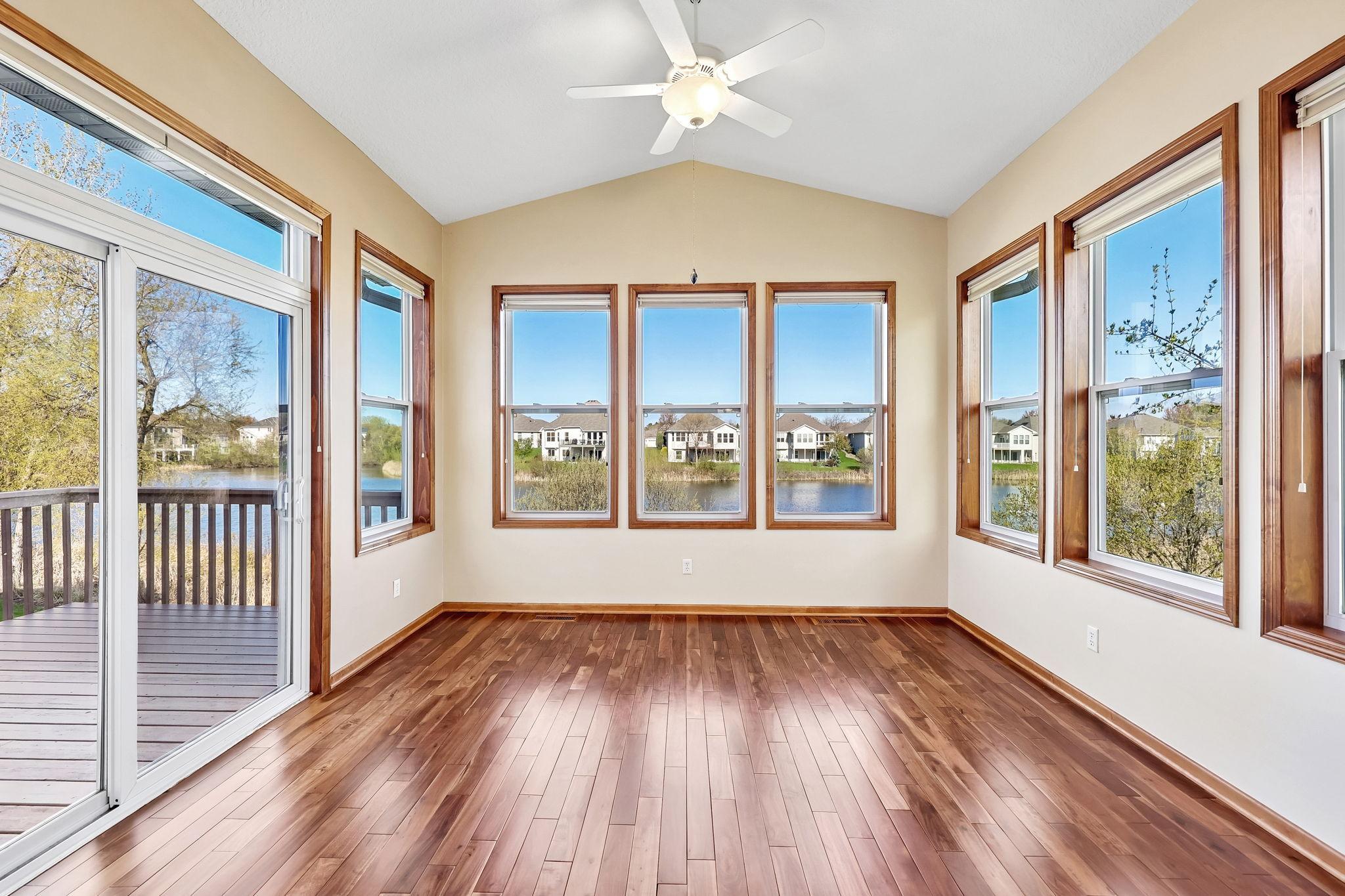 Relax on the sun-drenched 4 season porch, overlooking a serene pond