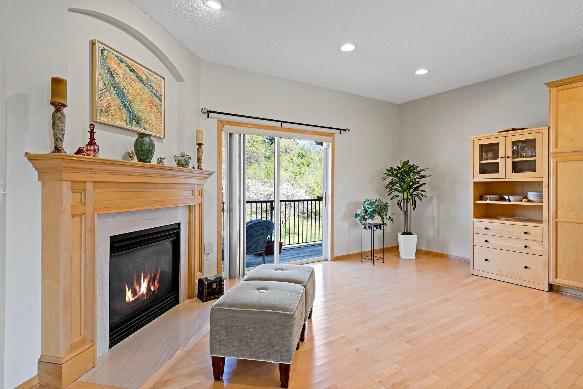 Wonderfully Convenient Family Lounge Just Off Kitchen Featuring A Cozy Fireplace!