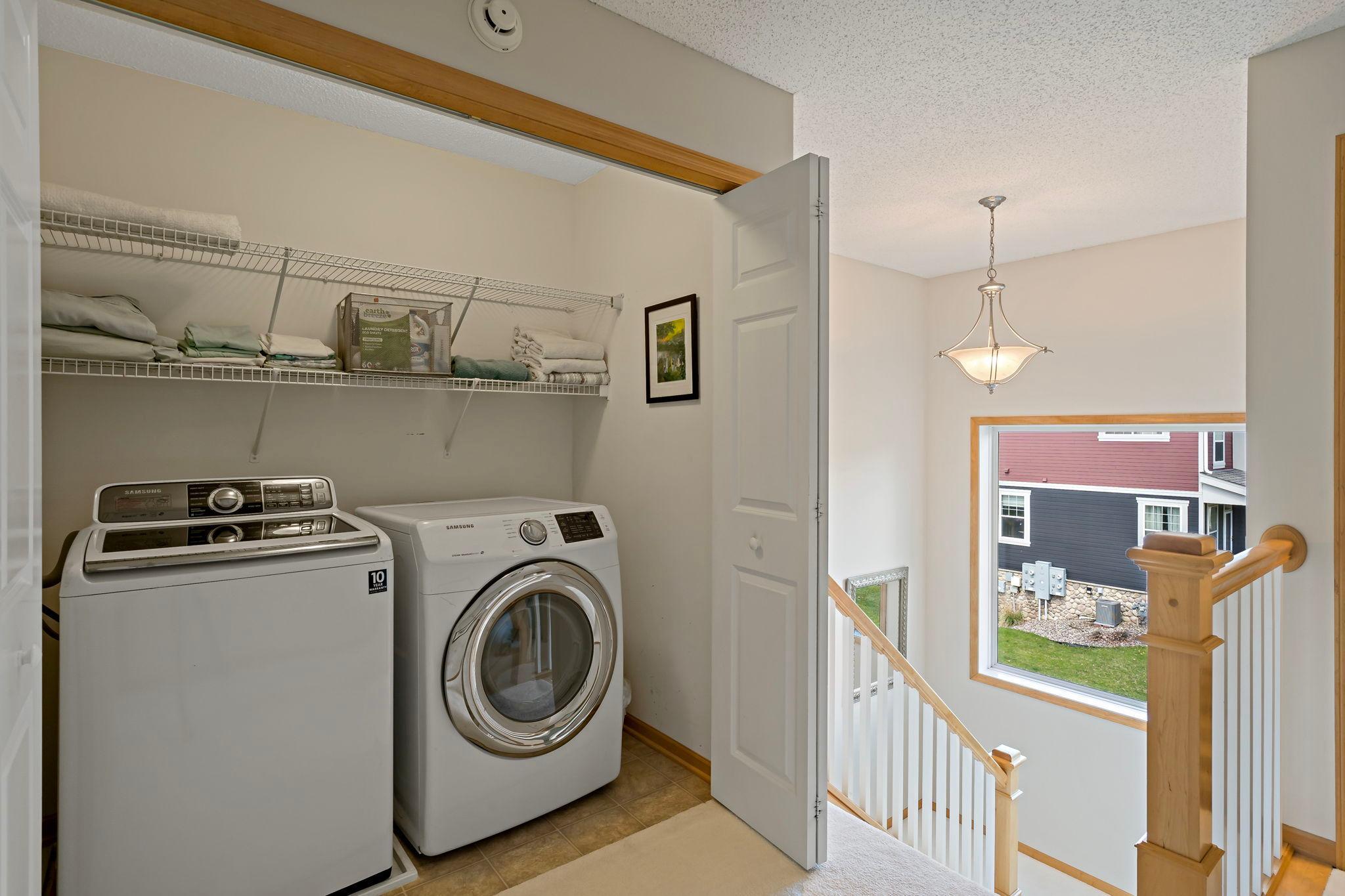 Laundry Neatly Tucked Away Near The Primary Suite