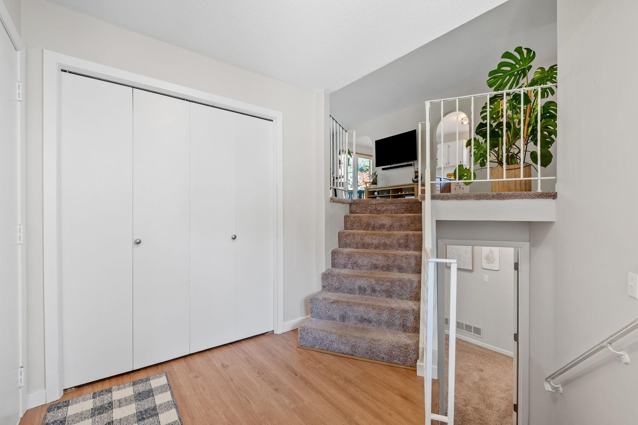 Spacious entryway with a large closet for all of your coats and shoes.