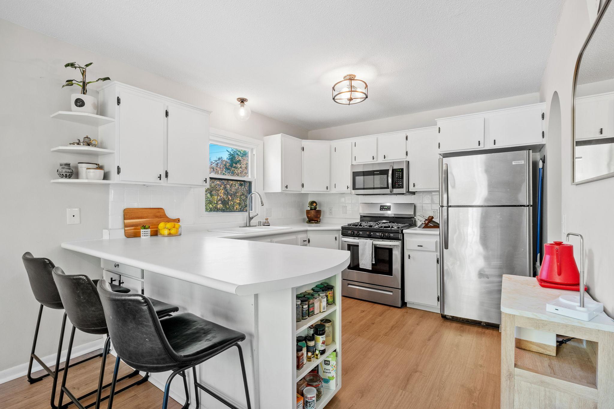 ew luxury vinyl tile flooring in the kitchen adds both durability and elegance.