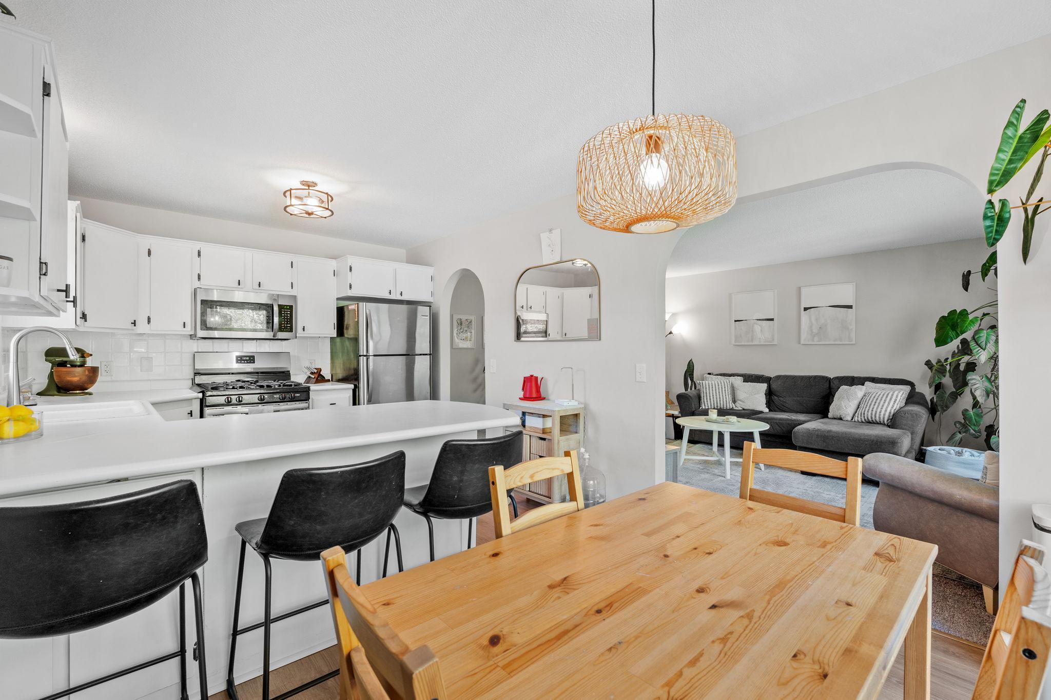 Stainless steel appliances and updated light fixtures add a touch of modern.