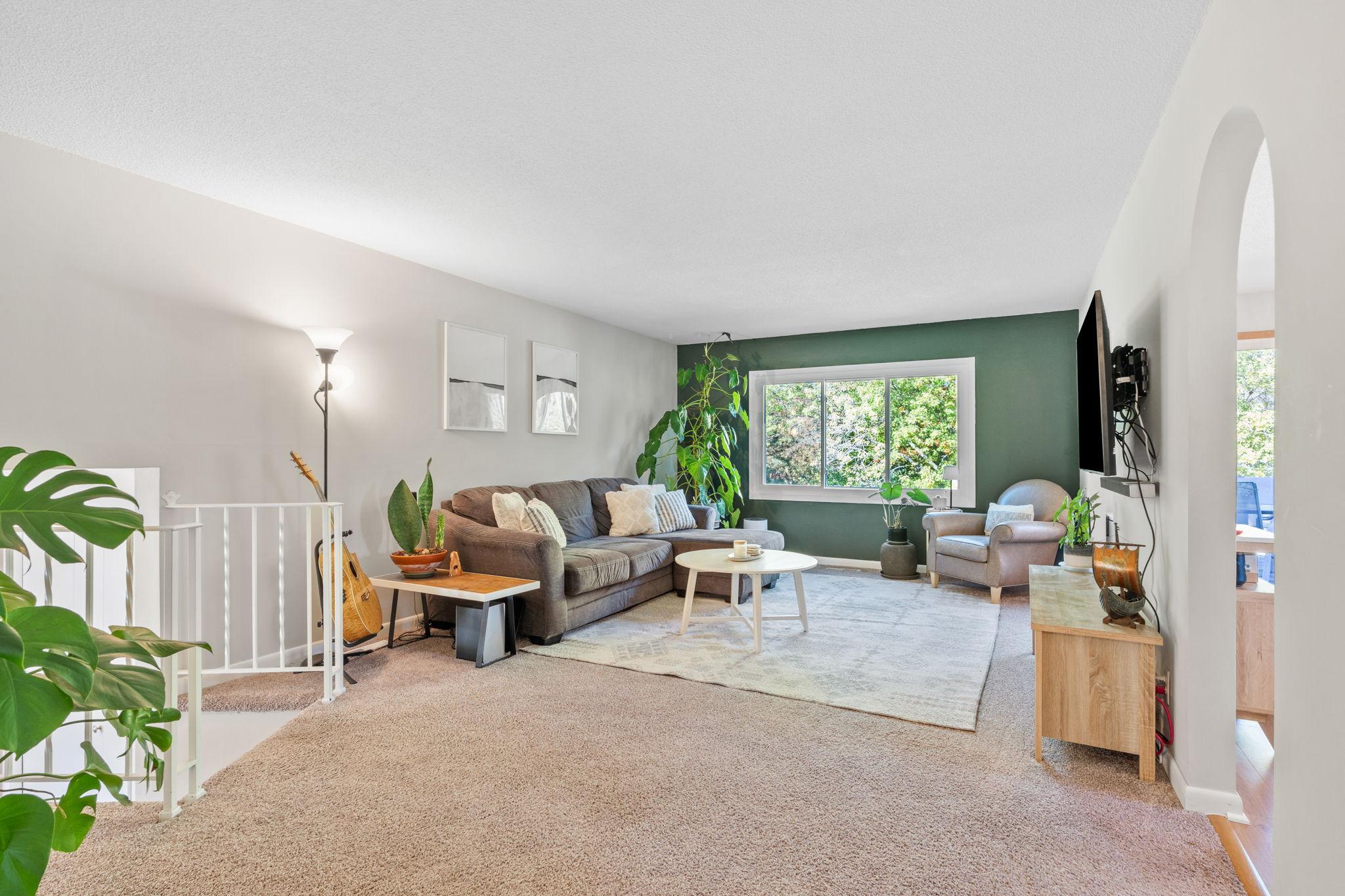 Large windows flood the upper level with natural light.