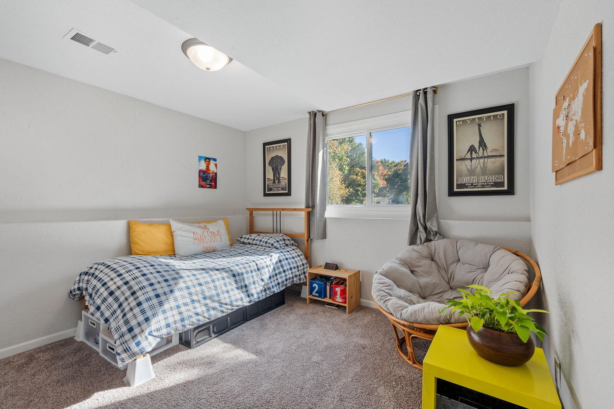 Two more bedrooms grace the lower level, perfect for guests.