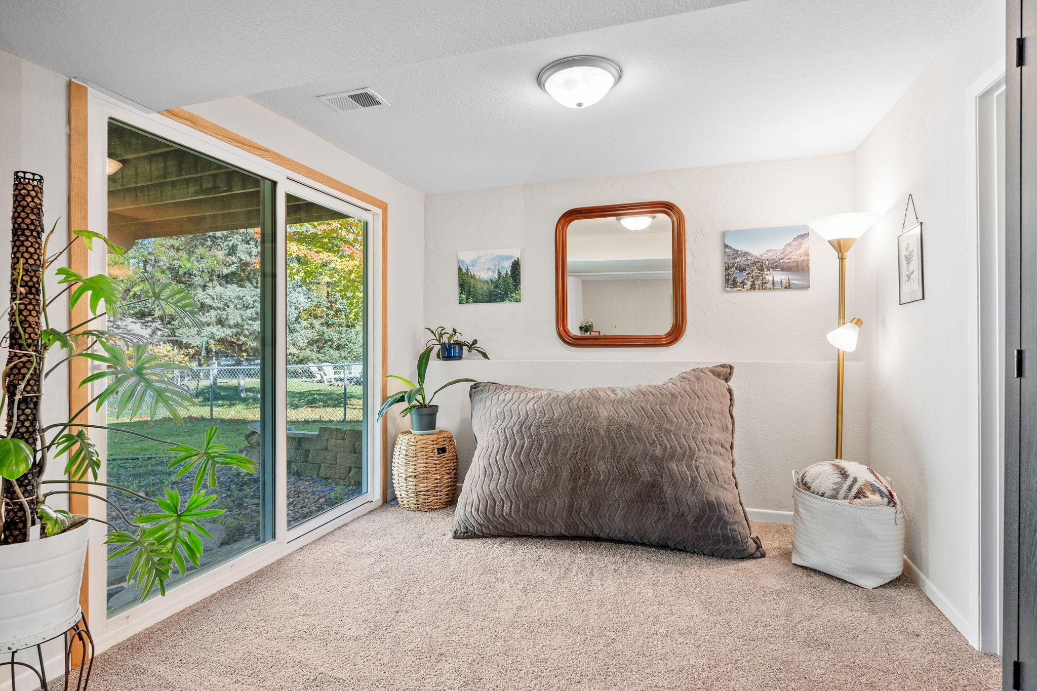 The lower level walkout provides easy access to the large fenced in back yard.
