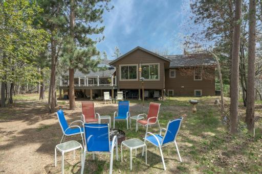 Backyard with firepit and large deck for entertaining!!