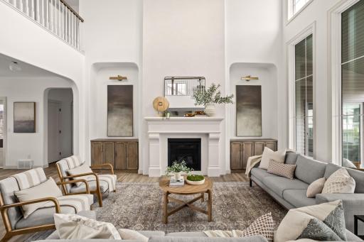 Venetian Plaster and stone fireplace, built ins, art lighting