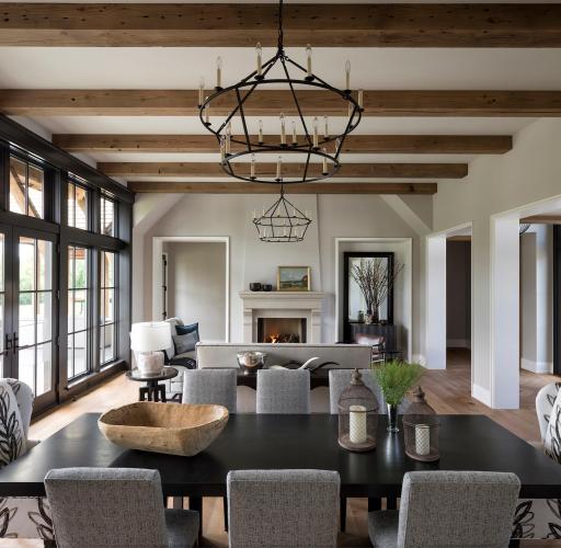 Custom oak beams and stone surround fireplace
