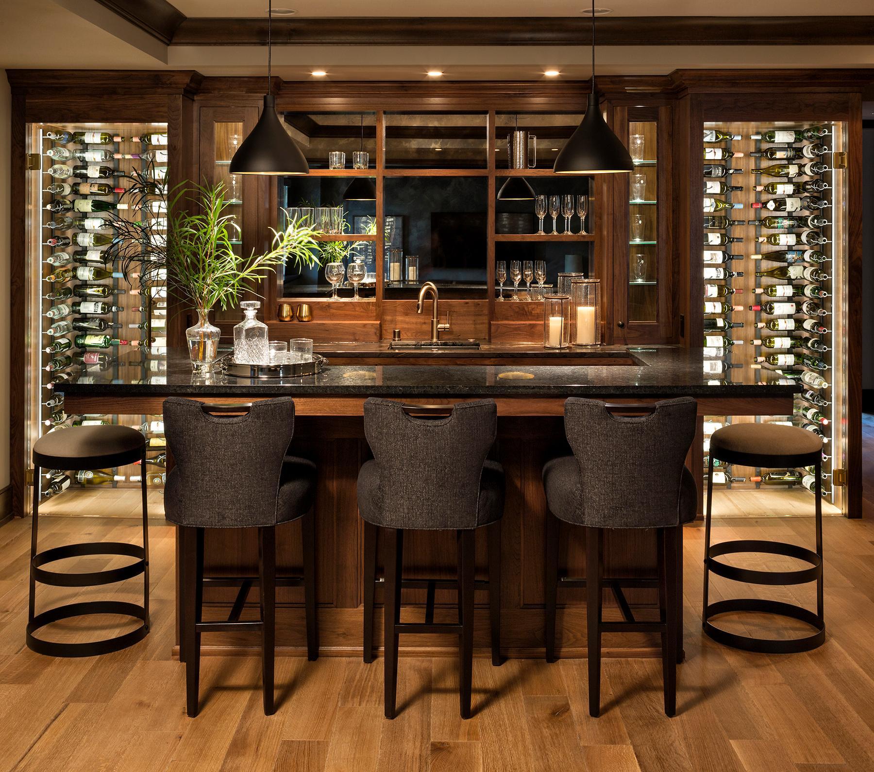 Walnut bar with copper top, ice-maker, drawer dishwasher and 2 True commercial beverage refrigerators with glass doors and gold hardware