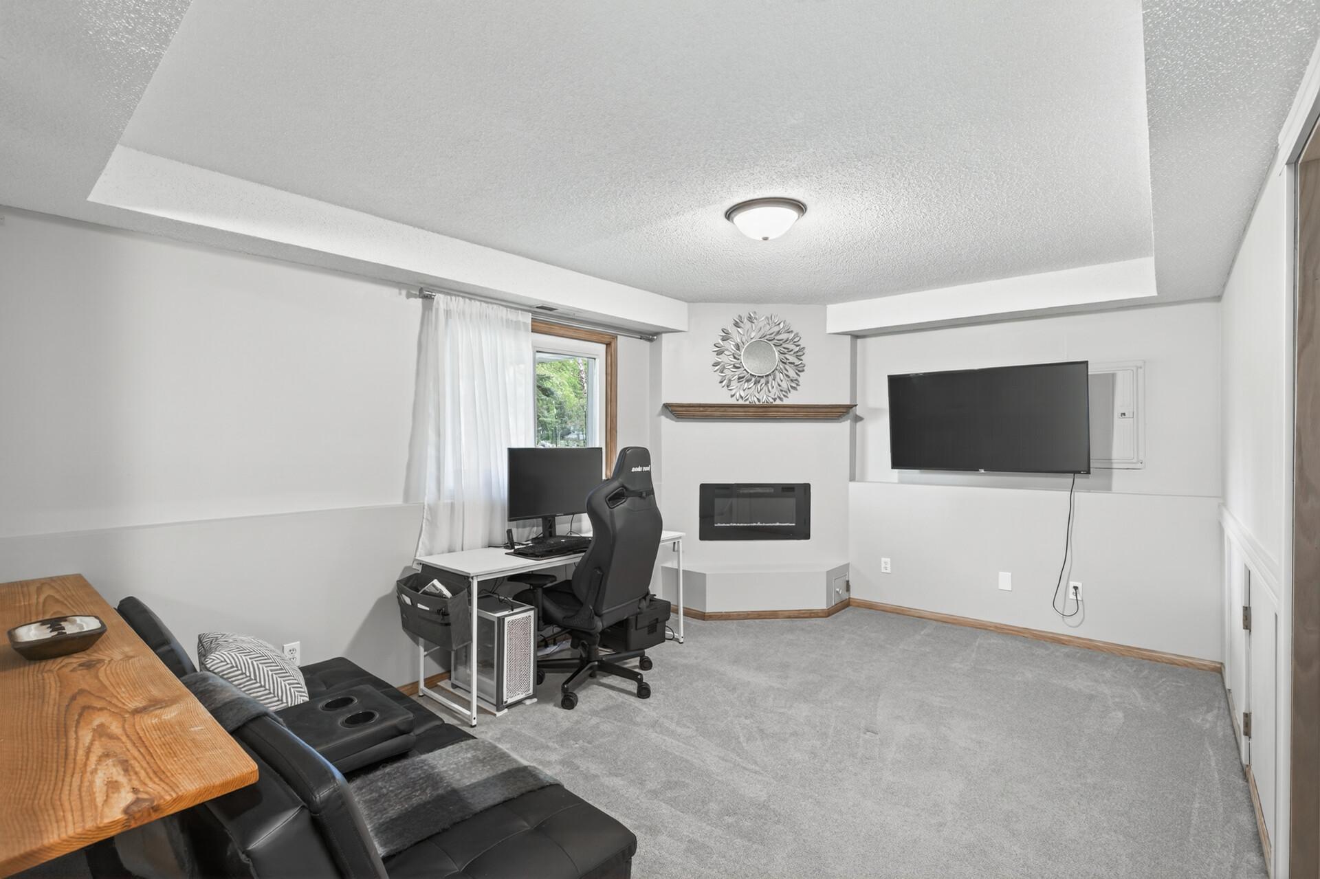 Lower level family room with fireplace