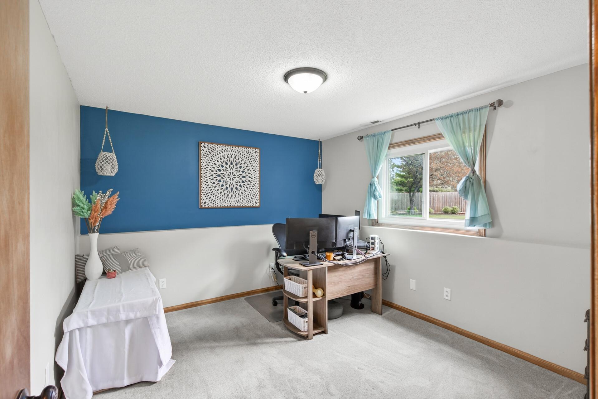 Lower level bedroom currently being used as an office