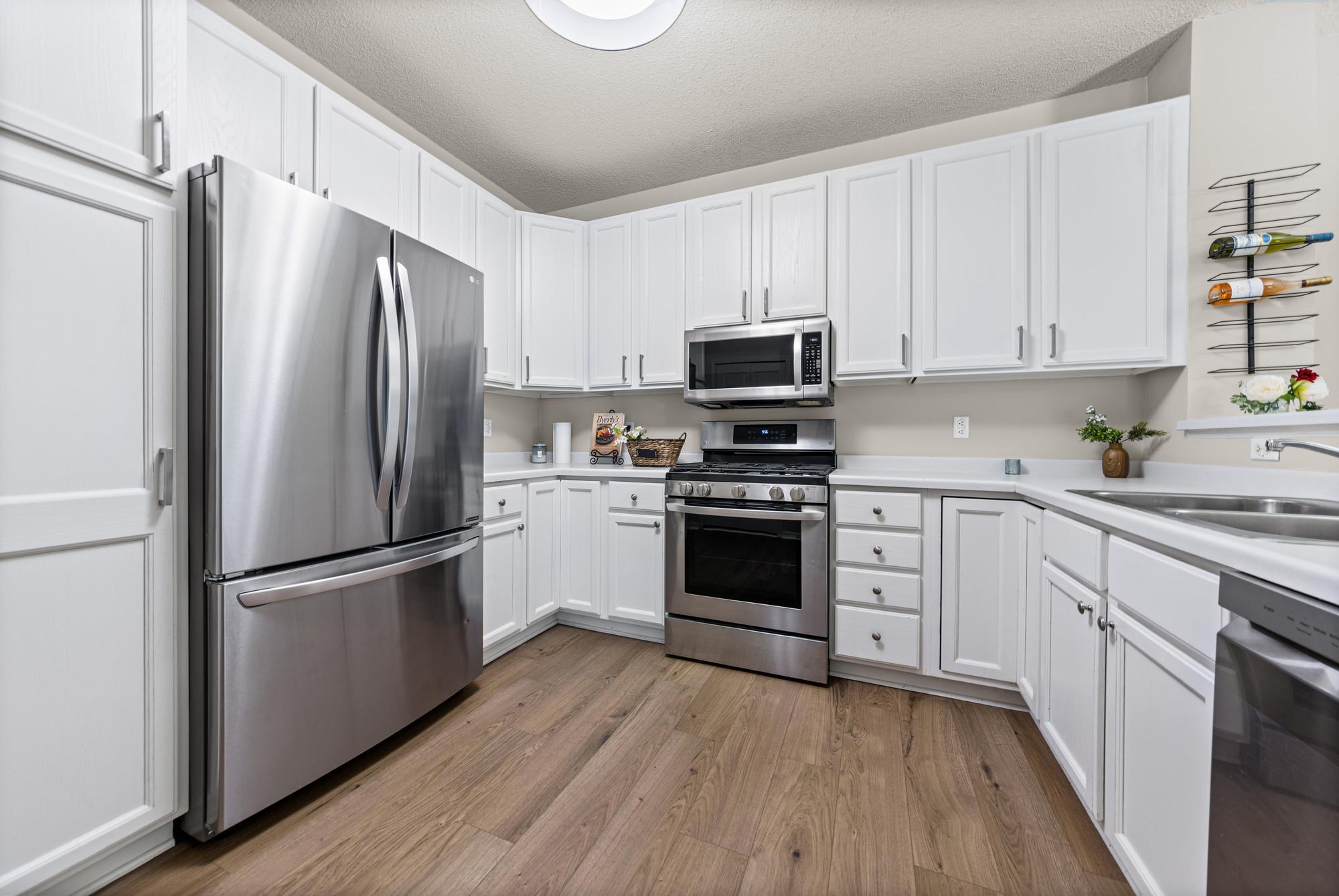 Kitchen with newer stainless steel appliances