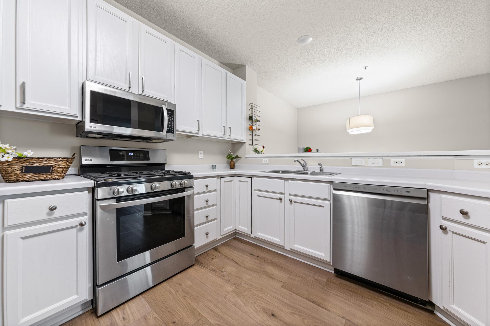 Kitchen with newer stainless steel appliances