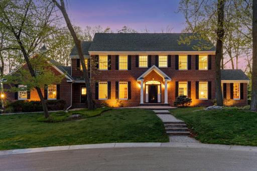 Welcome to 20150 Sweetwater Curve and exceptional red brick colonial estate!
