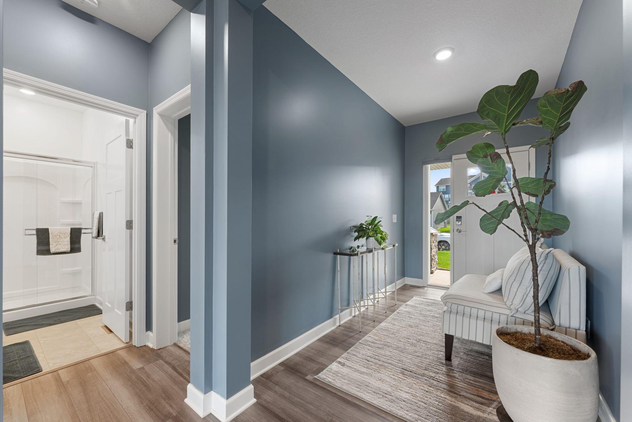 Entryway with view of bathroom