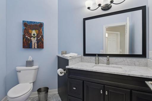 One of two half bathrooms on the main floor.