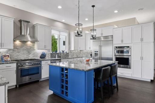State-of-the-art kitchen featuring high-end appliances is a chef's dream.