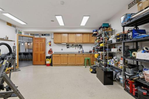 Huge workshop located in the lower level with office space and leads out to lower-level garage.