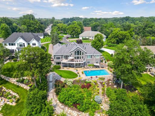 Two ways to the lakeshore surrounded by beautiful landscaping