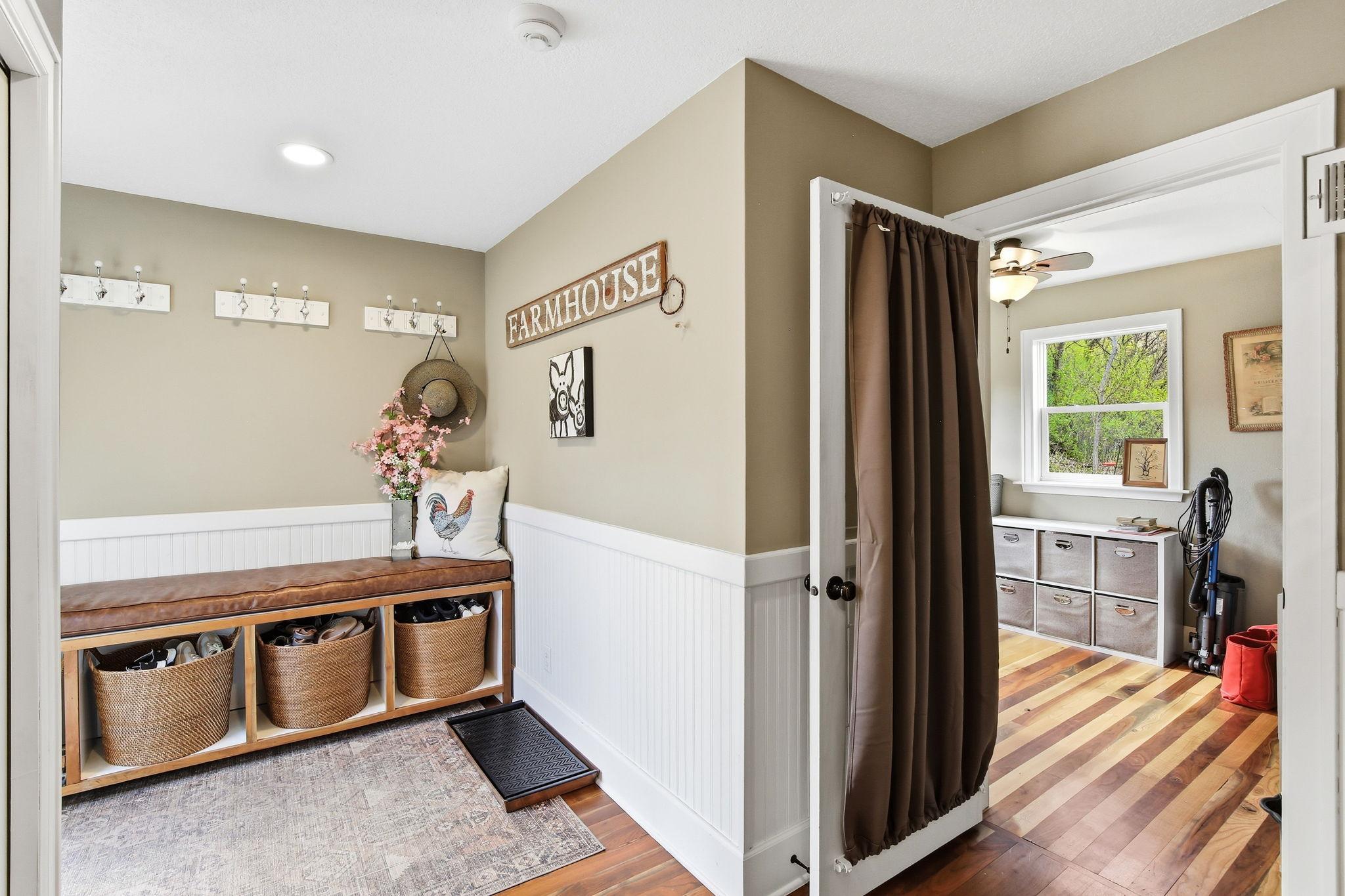 Practical mudroom with built-ins and storage - perfect transition space for country living.
