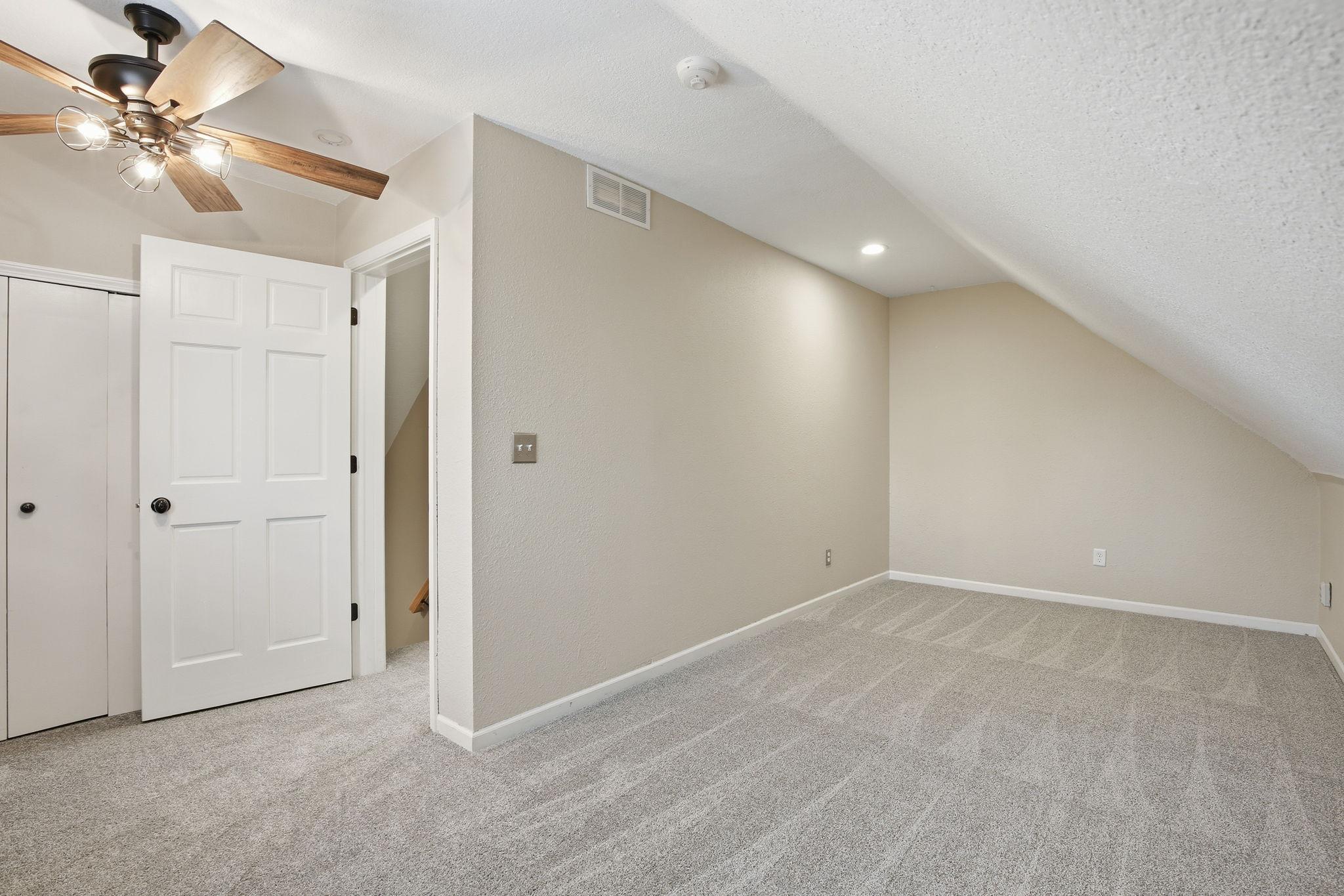 Second Upper Bedroom with fresh carpet.