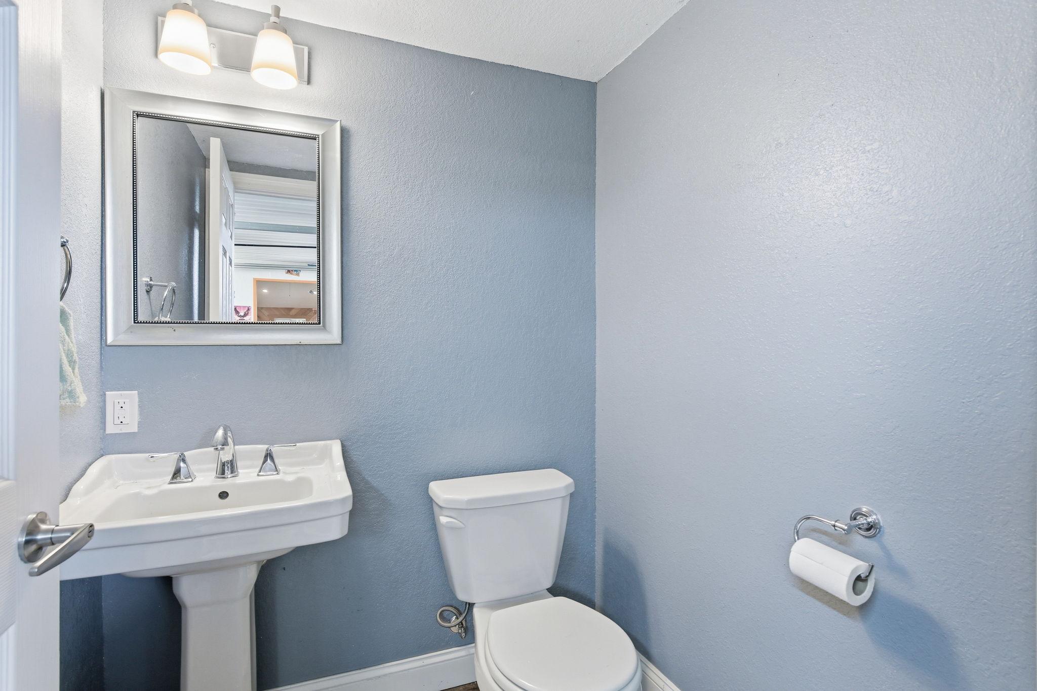 Convenient Half Bath located within the Shop - ideal for long workdays or outdoor projects.