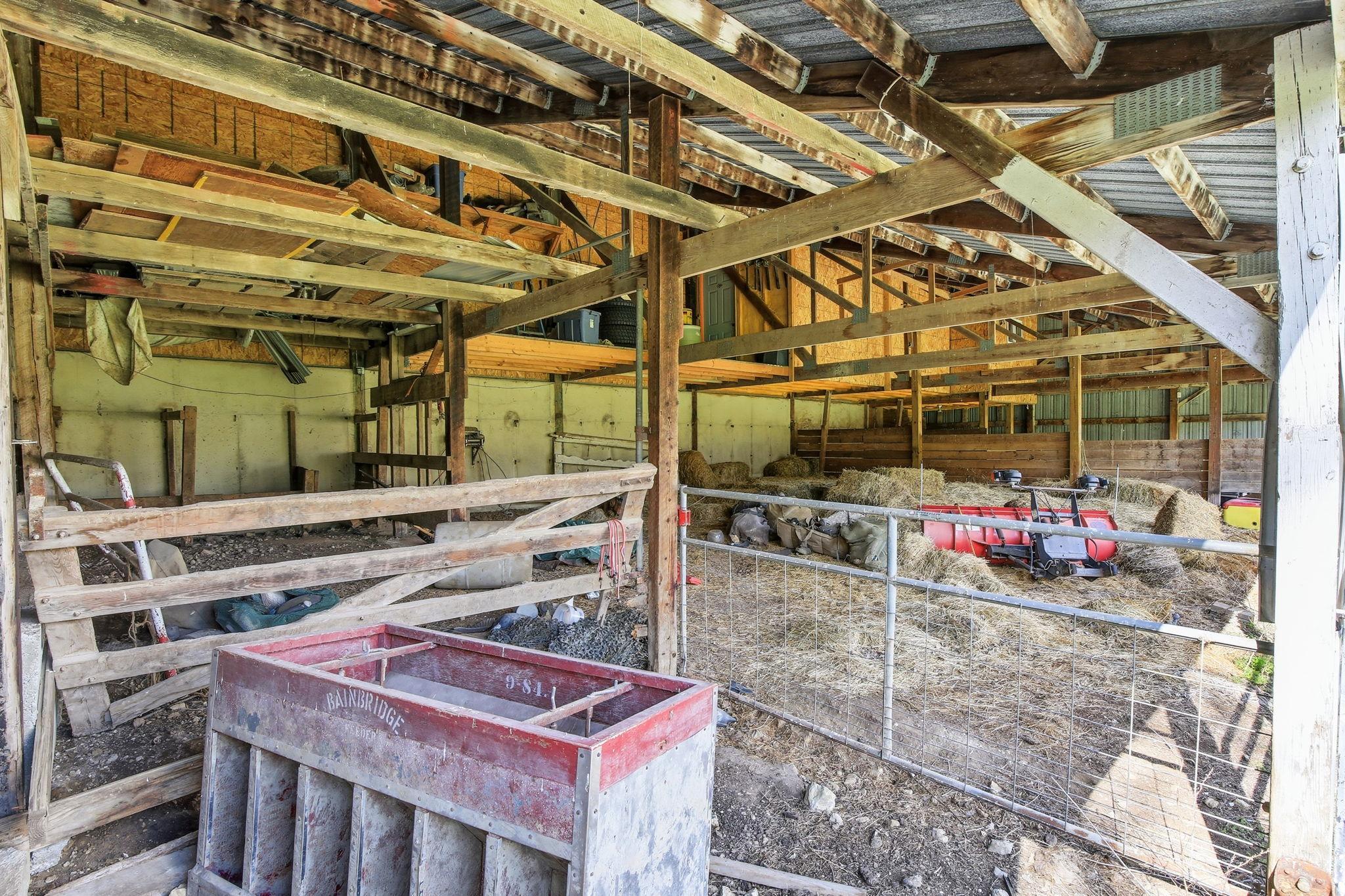Lower Barn area with stalls and open space—ready for animals or flexible agricultural use.