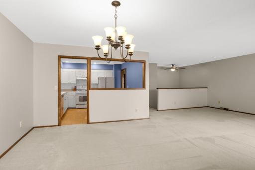 Convenient pass-through connects the kitchen and dining room.