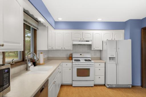 Large kitchen with abundant space for cooking and gathering.