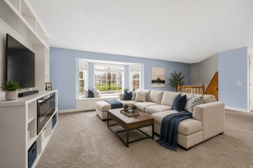 Sun-filled living room featuring abundant natural light, creating a warm and inviting Virtually Staged photo