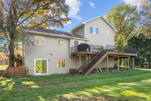 Walk out to the large back yard from the deck, or the lower level.