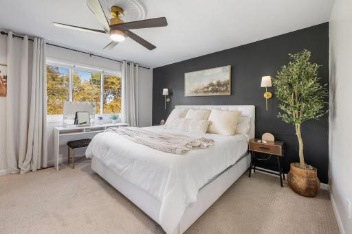 Welcome to this primary suite with back yard views and luxury bathroom.