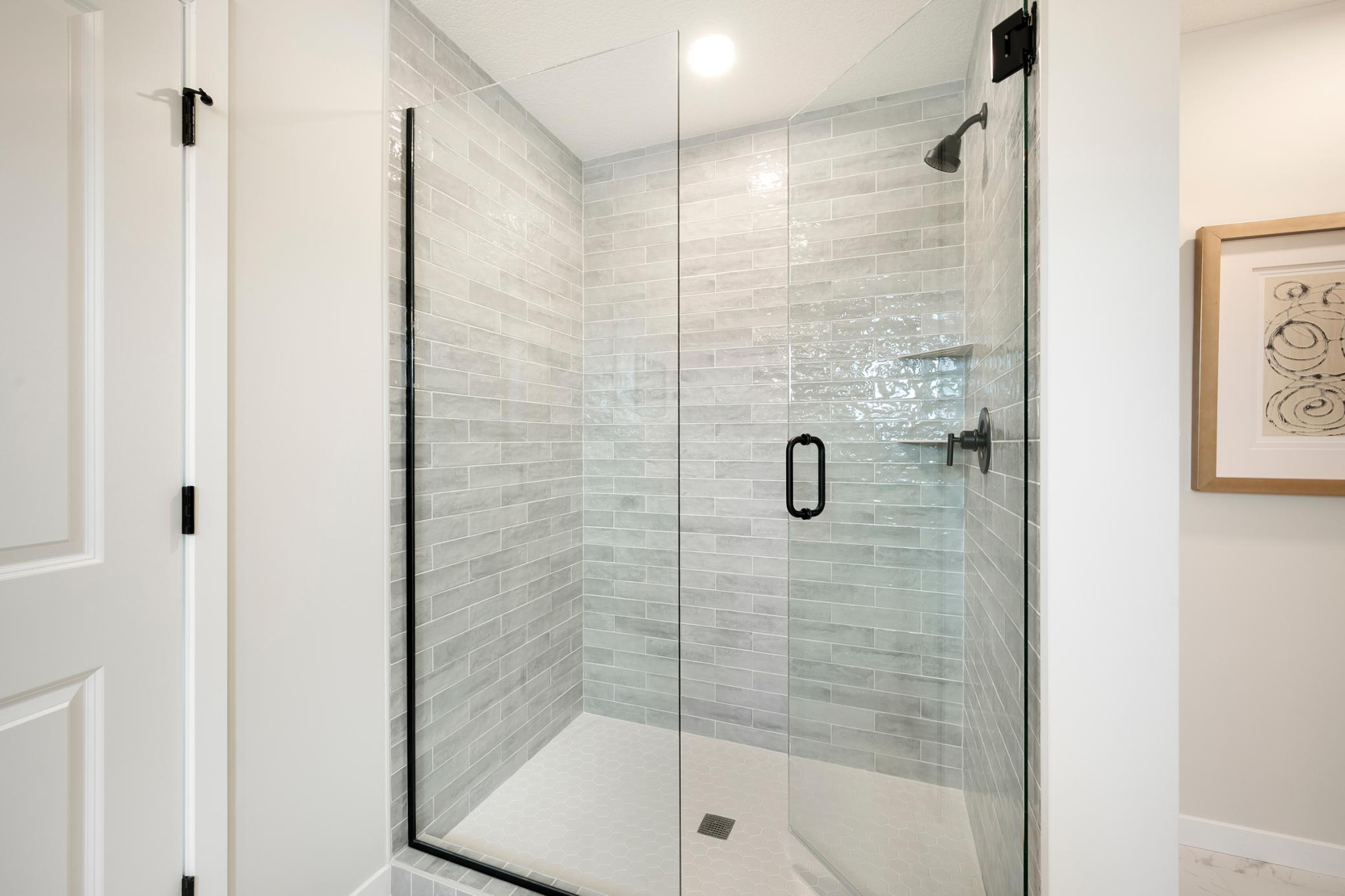 This home includes a separate Tub (not shown), AND Large Shower!