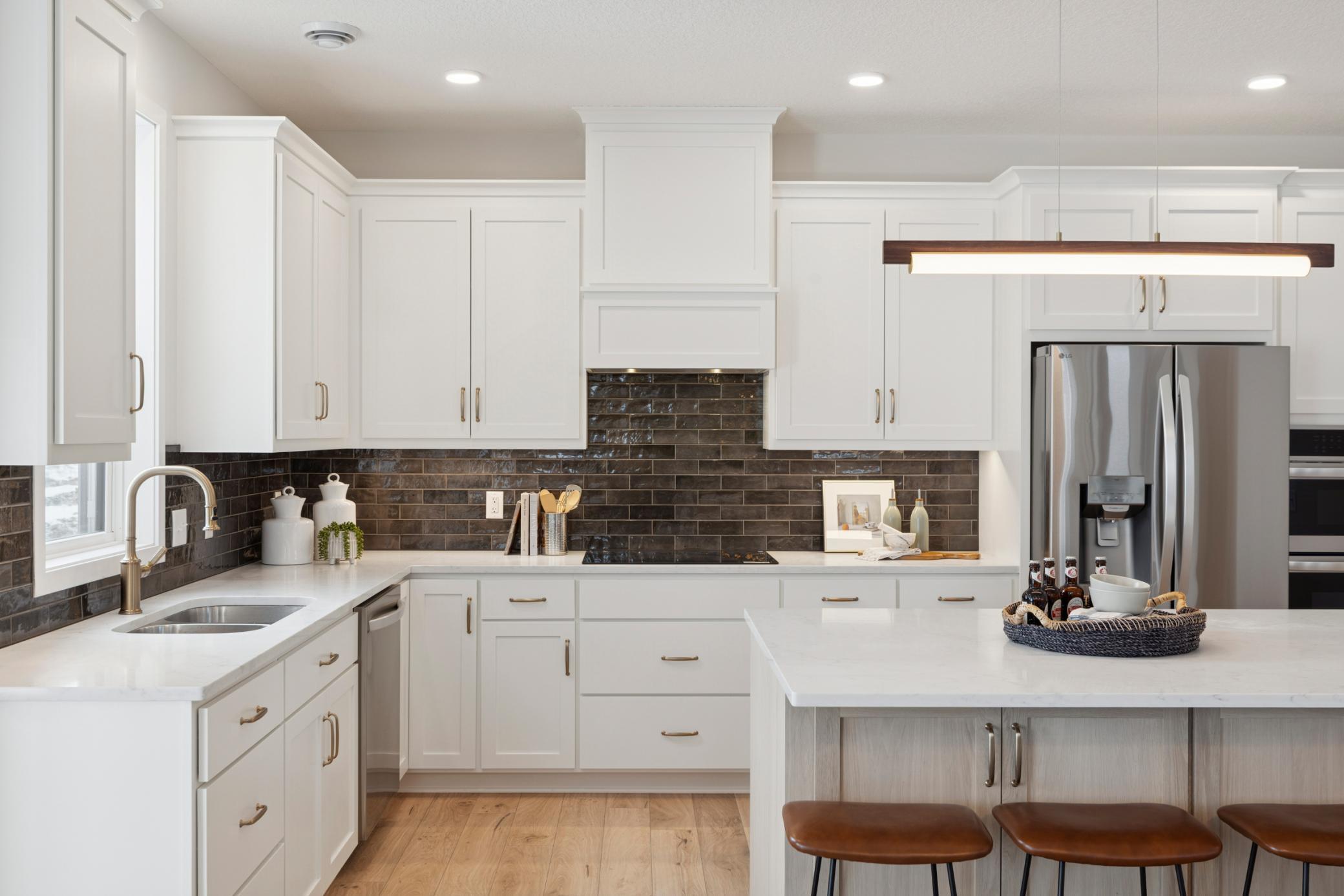 This home is under construction! Ready in July! Photos taken from model of similar floor plan. Photos may not depict actual home plan configuration. Features/materials/finishes shown contain options that are not included in price.