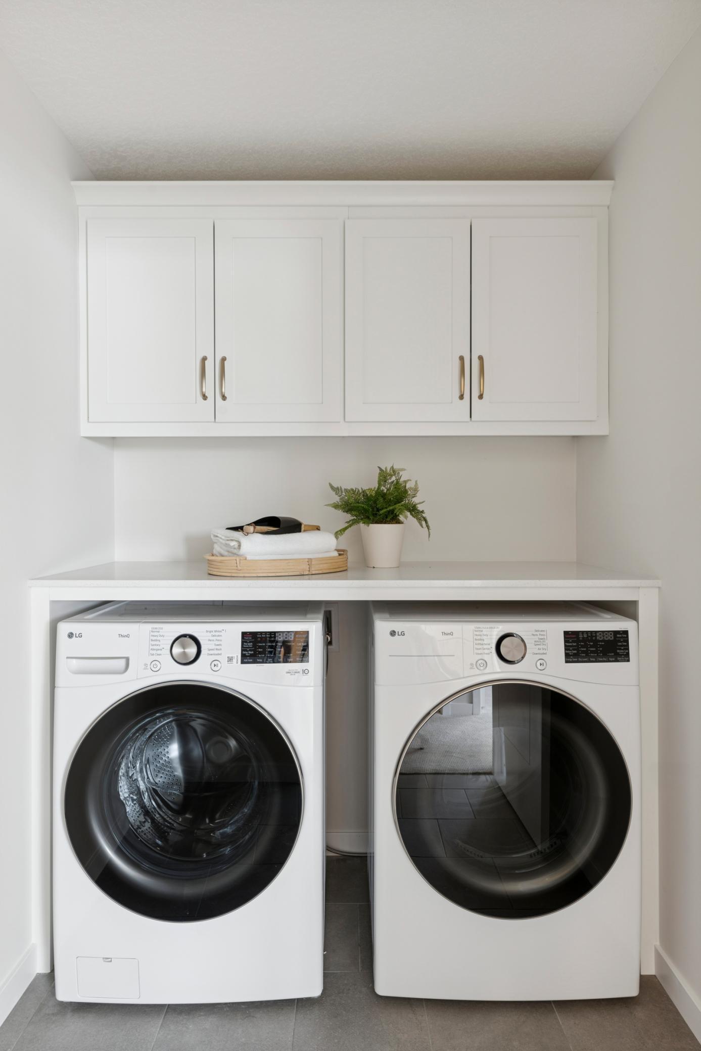 2nd Floor includes convenient laundry room with washer & dryer, folding space and upper cabinets for storage! This home is under construction. Photos from similar plan. Photos may not depict actual home plan configuration.