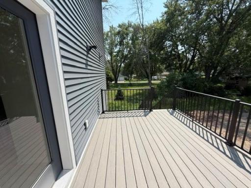 Low-Maintenance deck with stairs included! Your outdoor dining area! and Your year-round grilling deck off the kitchen! Landscaping, sod and irrigation also included and coming soon.