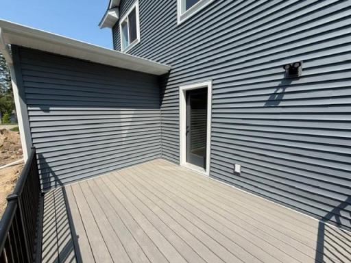 Low-Maintenance deck with stairs included! Your outdoor dining area! and Your year-round grilling deck off the kitchen! Landscaping, sod and irrigation also included and coming soon.