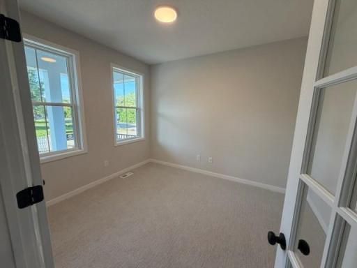 Front Flex Room with double doors!