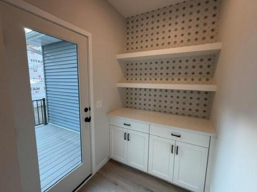 Our morning kitchen! with easy access to deck included! Move right in!