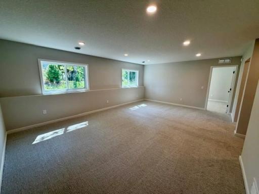 Finished lower level include large family room, game area, 5th bedroom and another bathroom and linen closet! This home is under construction and almost complete