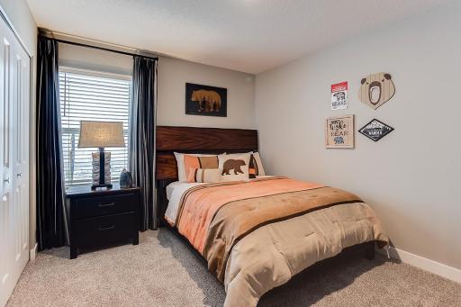 Each of the homes three additional bedrooms are also abundant in size! (Photo of model, colors are similar)