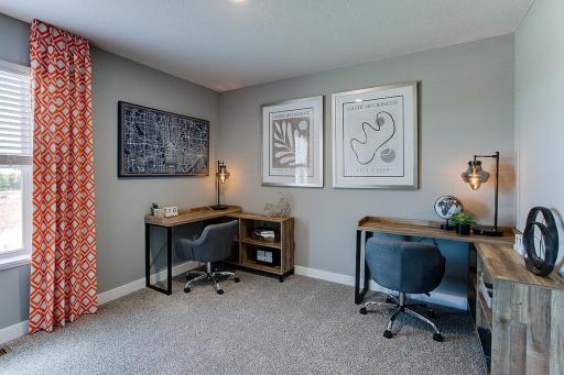 Secondary Bedroom can be used as an office or bedroom. (Photo of model, colors are similar)