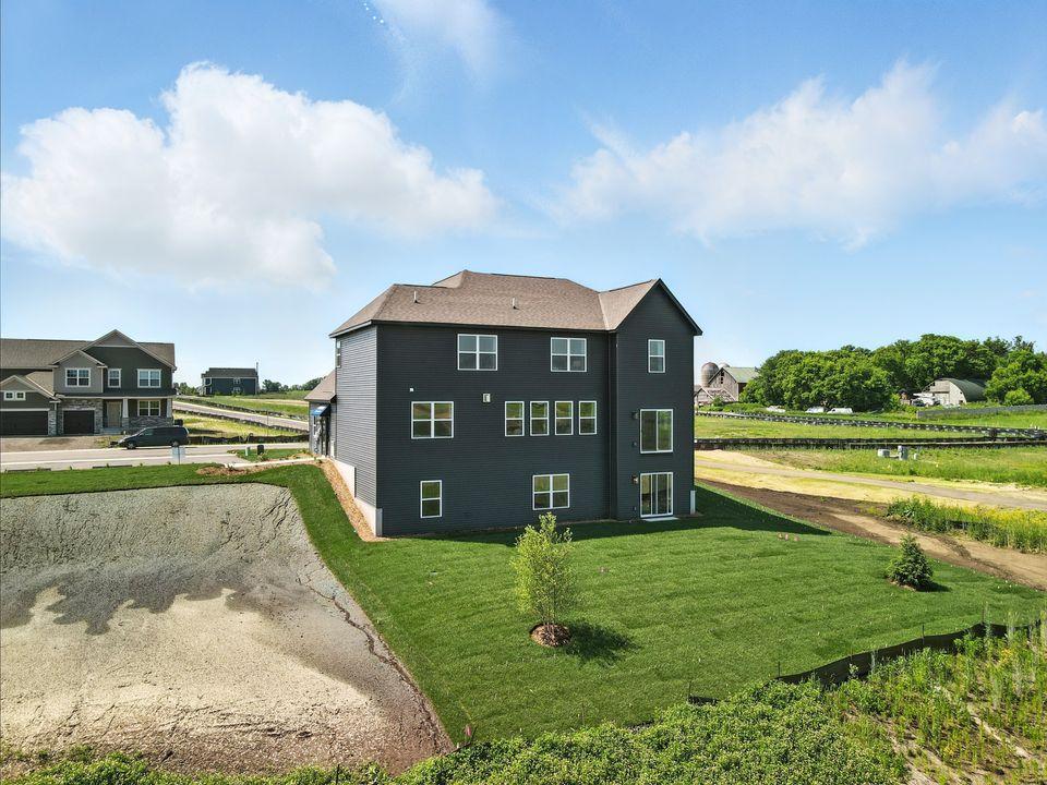 Home backs to 7.5 acres if open space.
